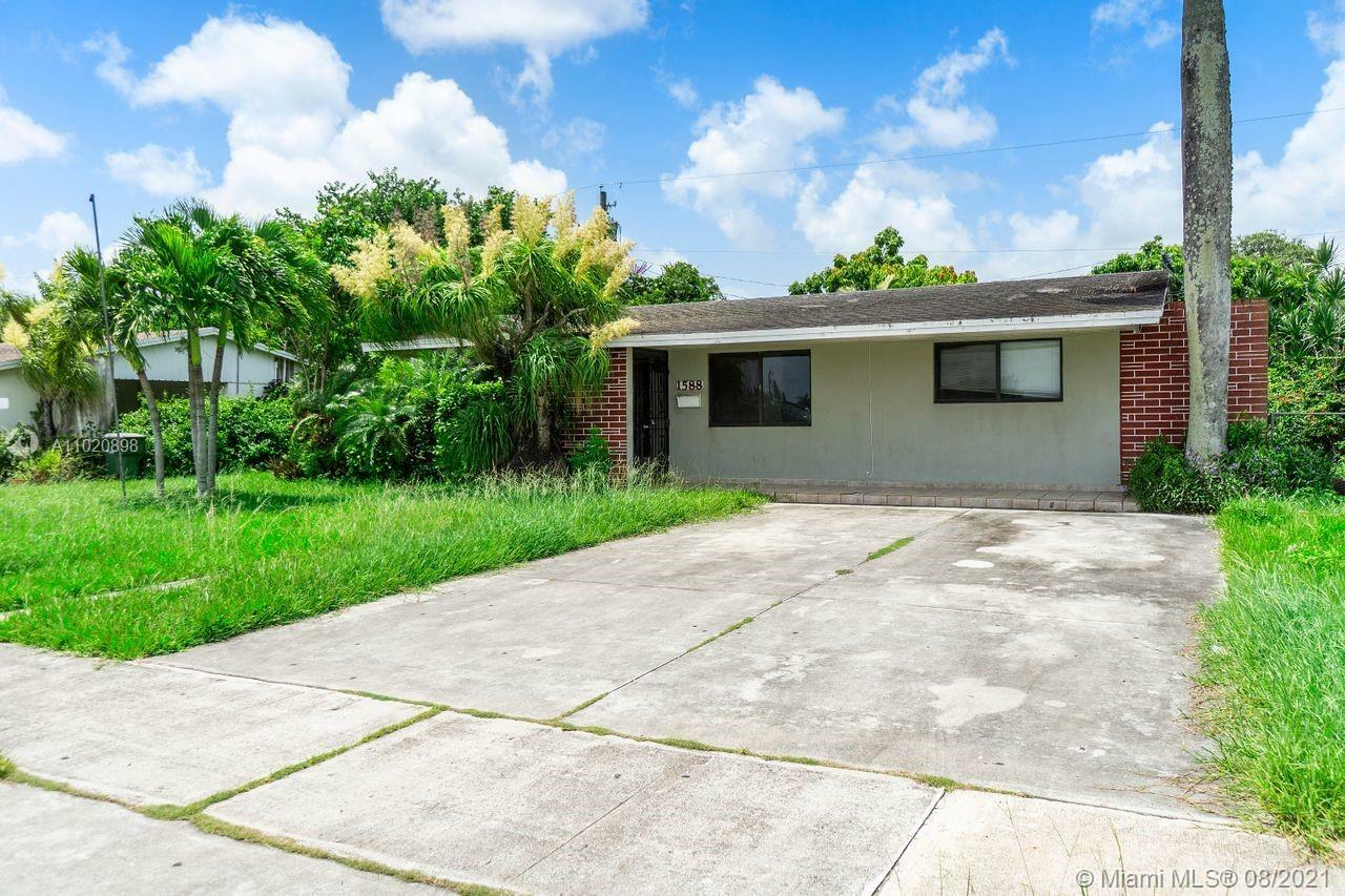 Property Photo:  1588 NW 8th Ave  FL 33030 