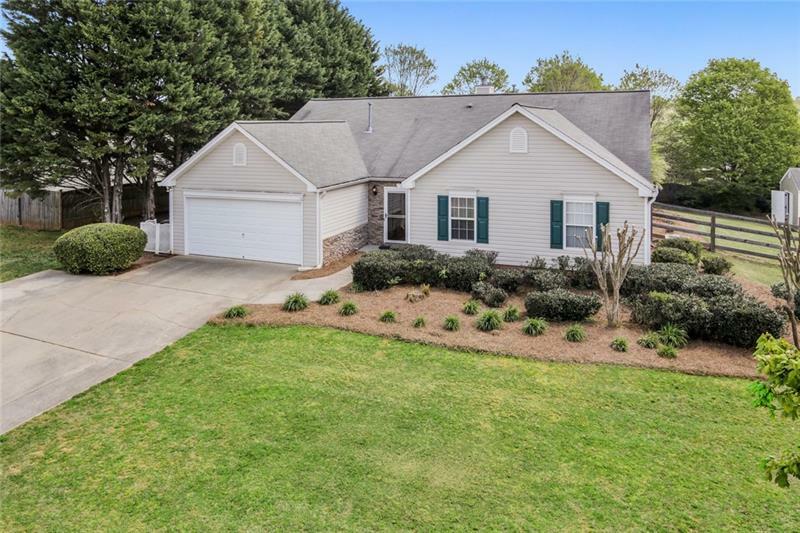 Property Photo:  7525 Tatum Woods Drive  GA 30028 