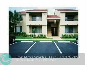 Property Photo:  651 Lyons Rd 10-101  FL 33063 