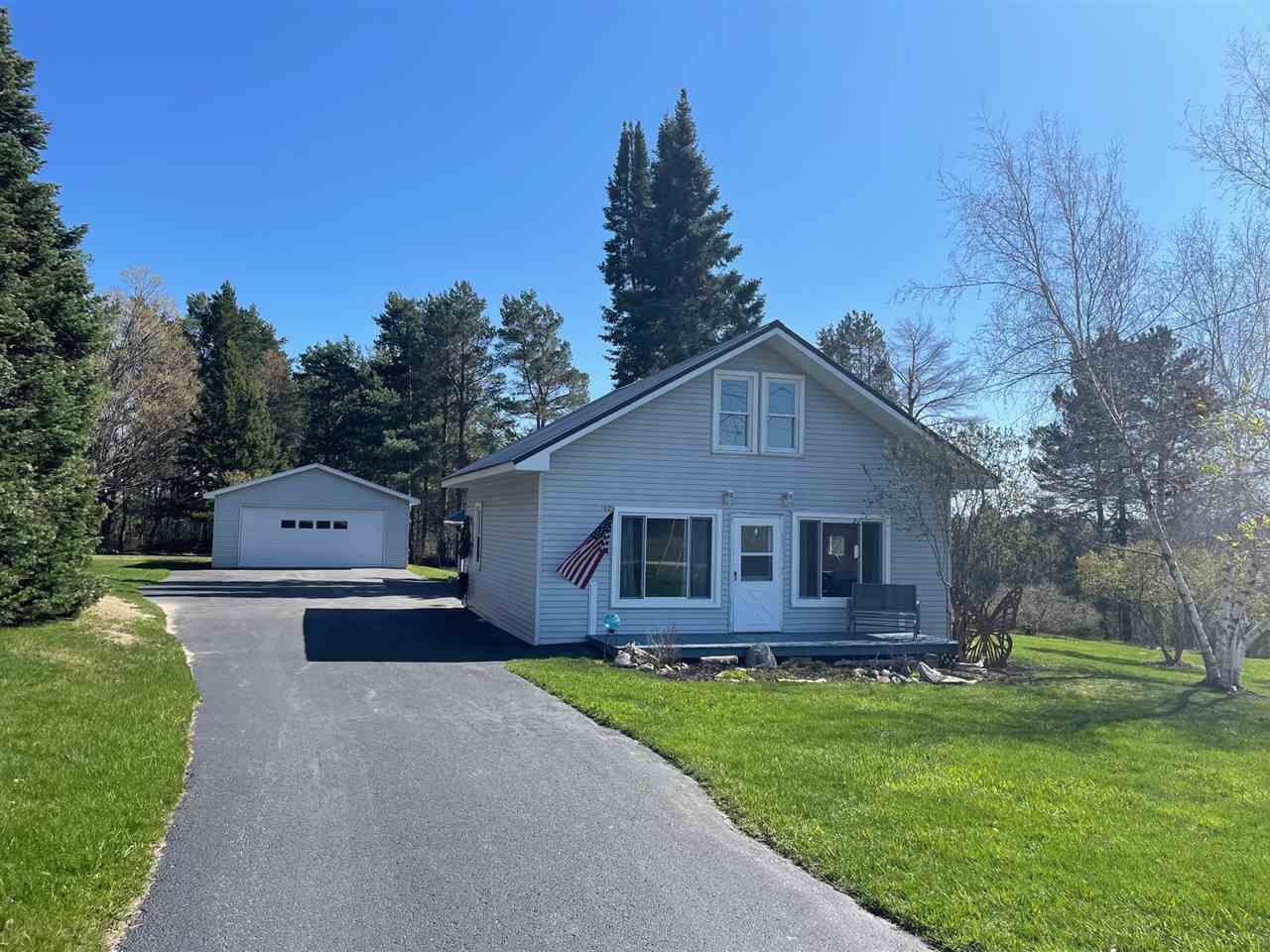 Property Photo:  102 Orchard  MI 49727 