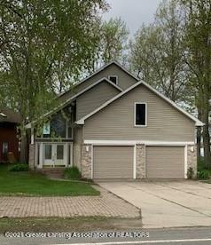 Property Photo:  6215 E Lake Drive  MI 48840 