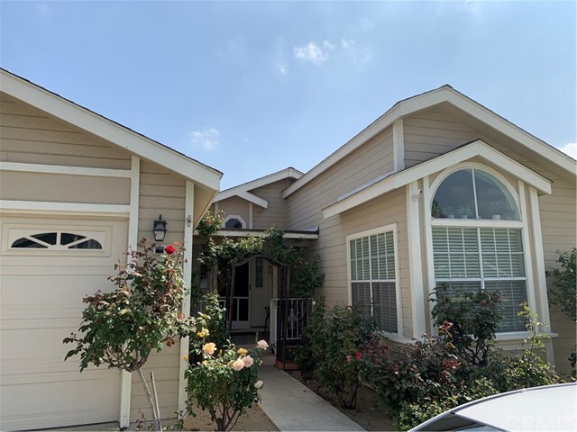 Property Photo: 140 W Pioneer Avenue 57 CA 92374