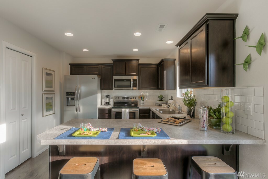 Property Photo: 10694 186th St Ct E 654 WA 98374