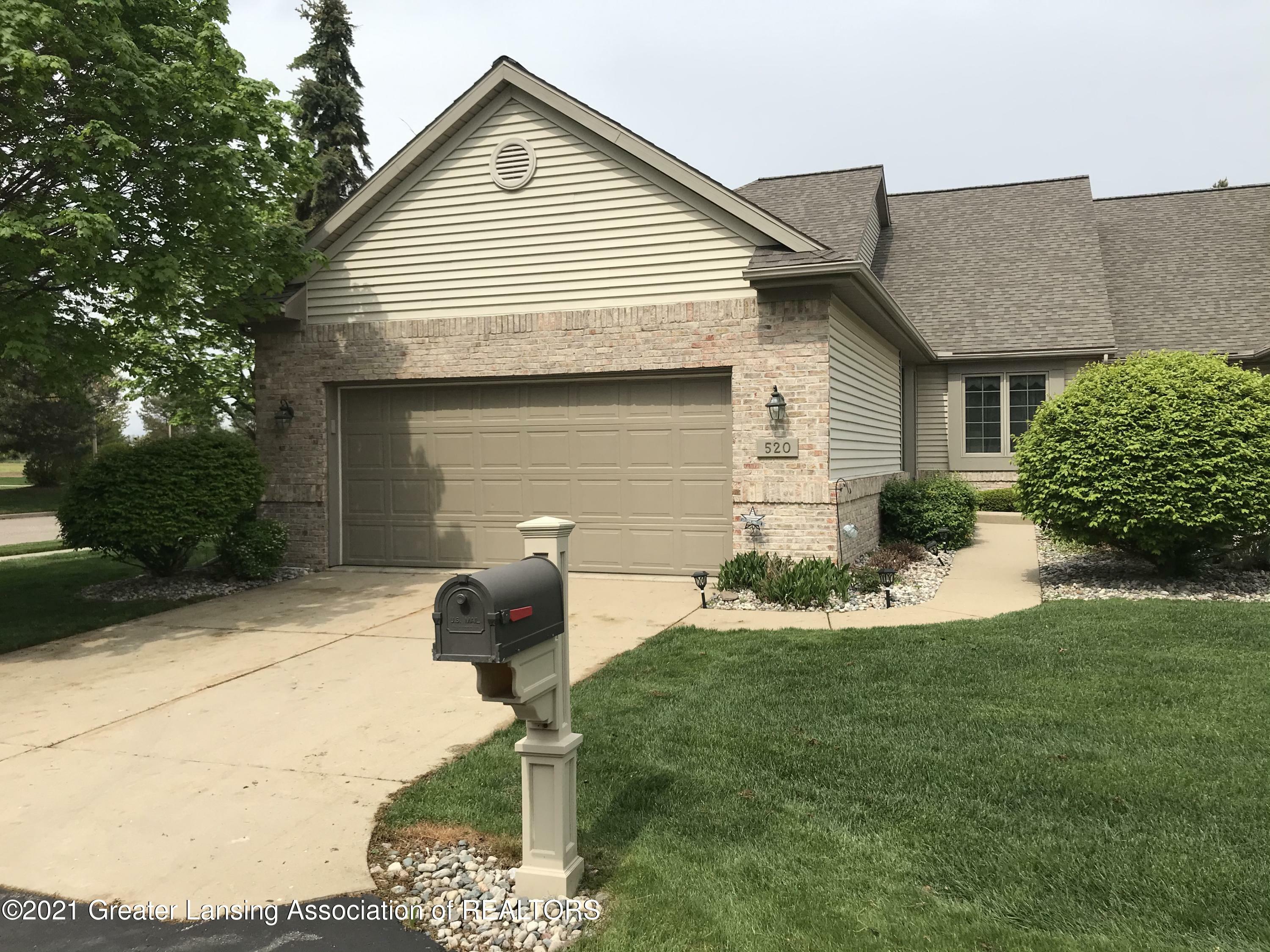 Property Photo:  520 Cherbourg Drive  MI 48917 