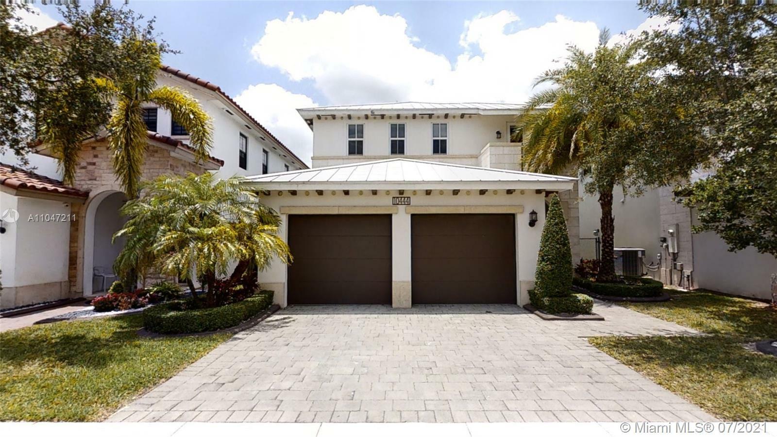 Property Photo:  10444 NW 70th Ln  FL 33178 