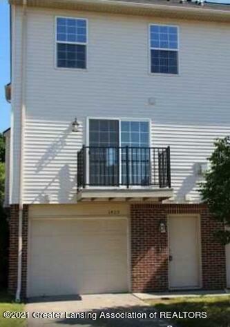 Property Photo:  1423 Academy Lane  MI 48906 