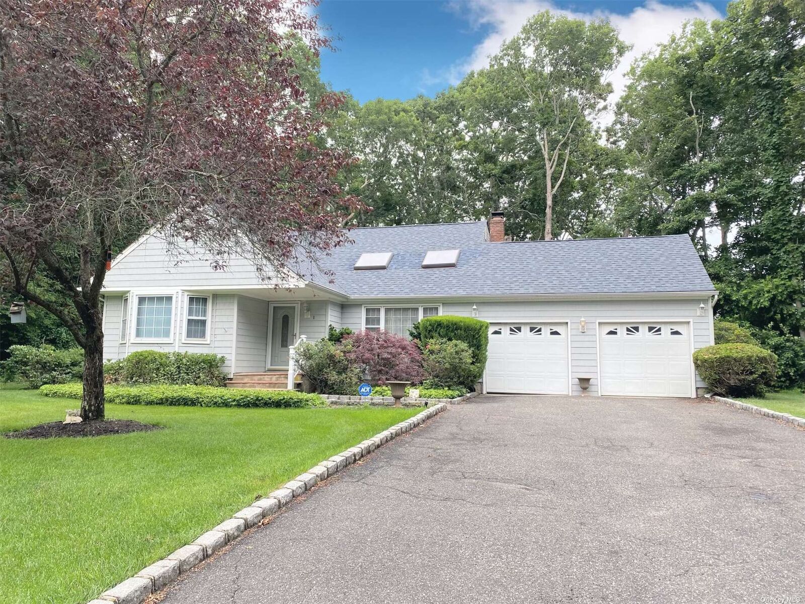 Property Photo:  1 Aster Place  NY 11955 