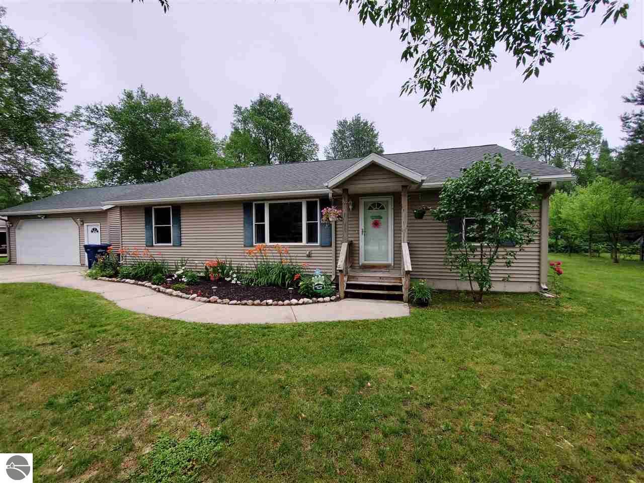 Property Photo:  3717 Driftwood Drive  MI 49601 