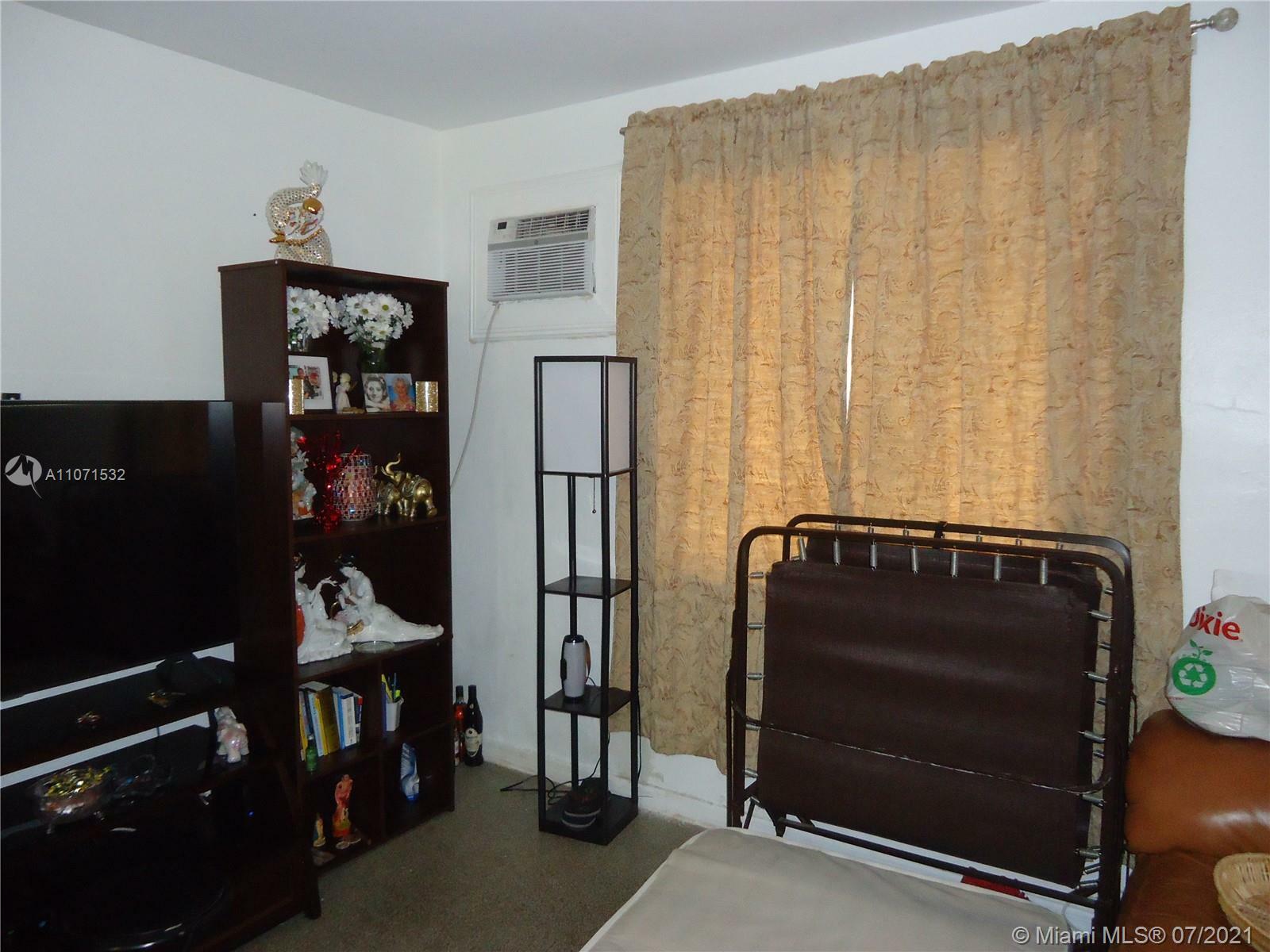 Property Photo:  208 SE 4th St  FL 33009 