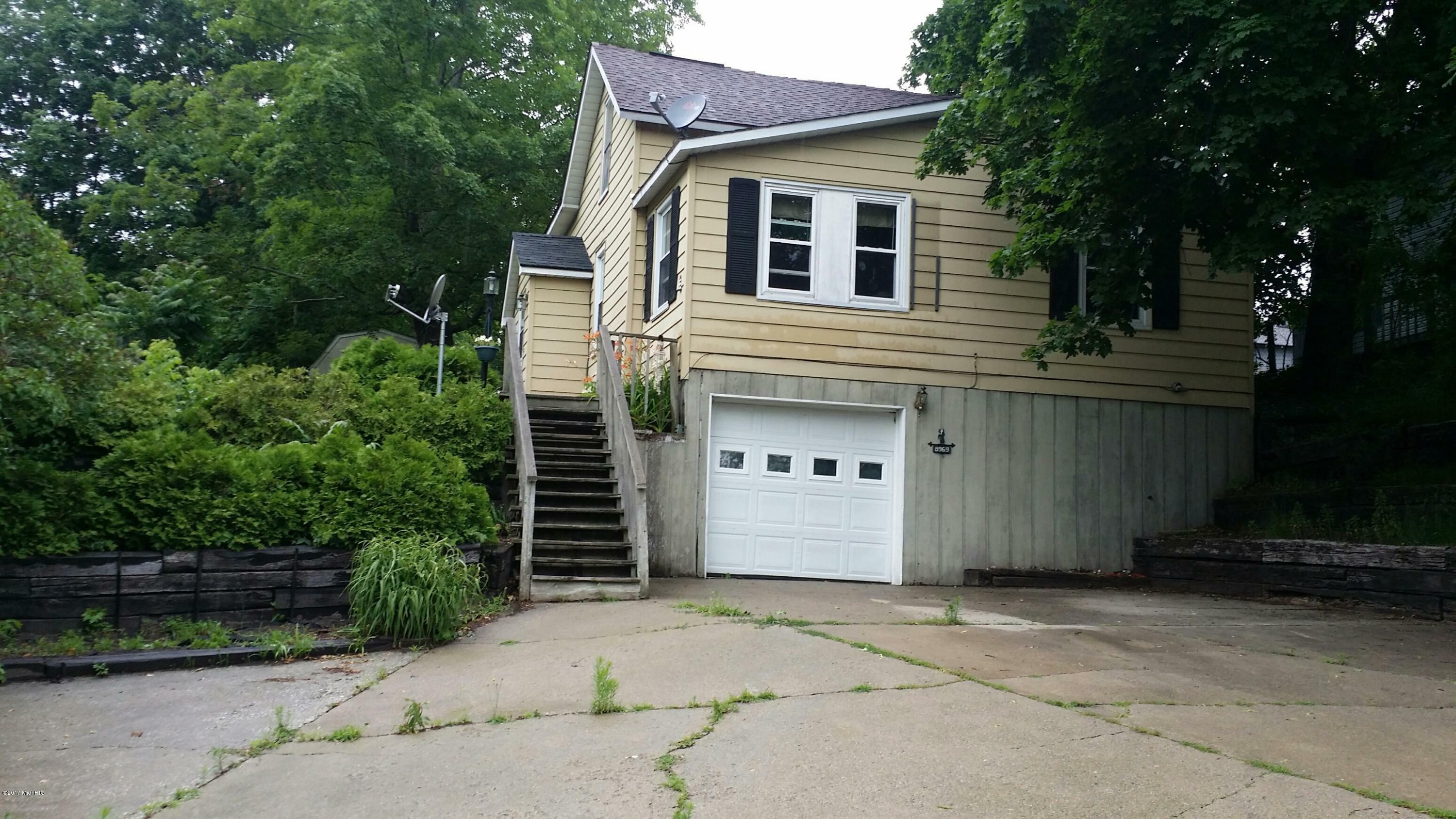 Property Photo:  8969 Ferry Street  MI 49437 