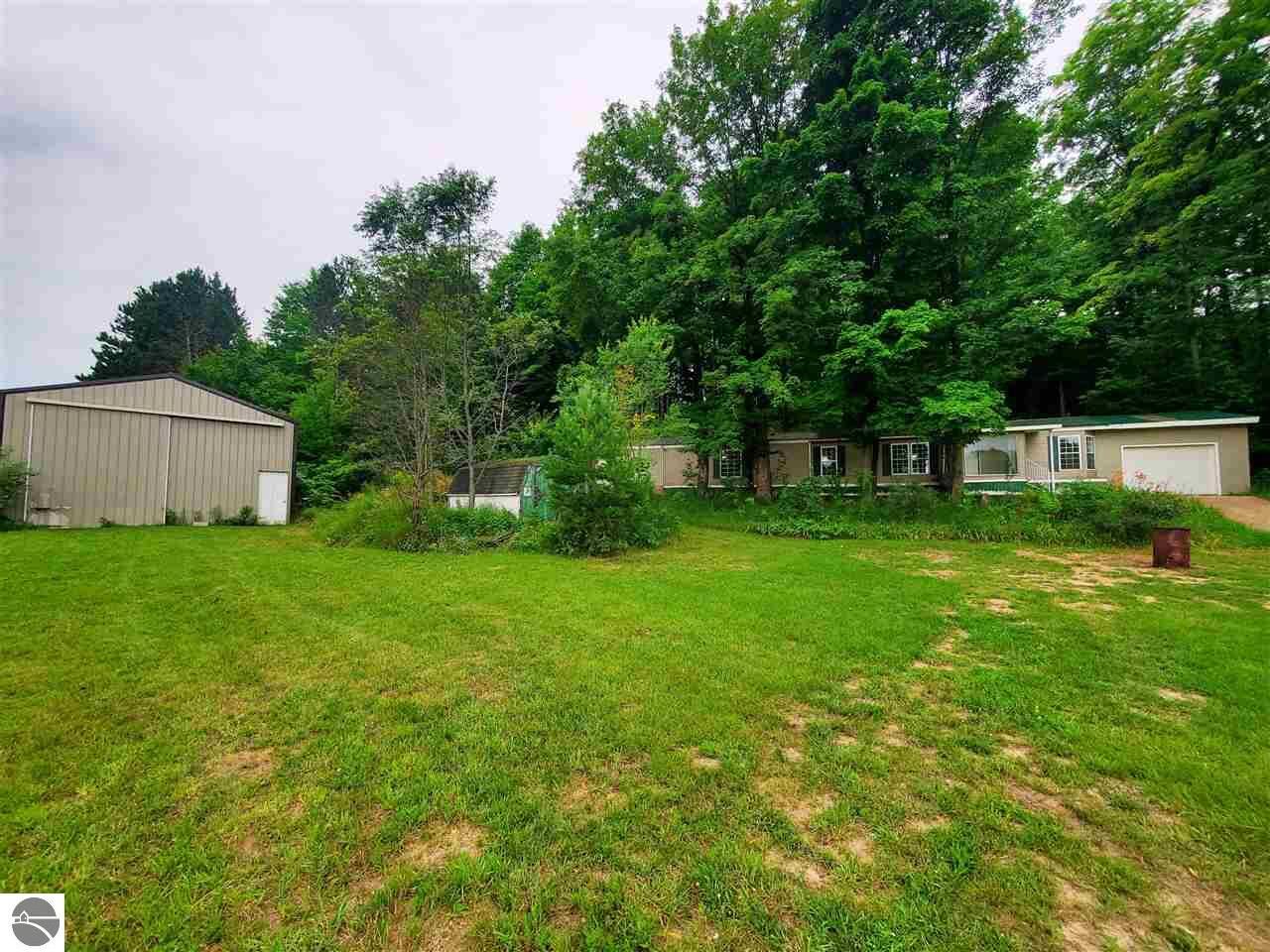 Property Photo:  3931 N 11 1/2 Road  MI 49668 