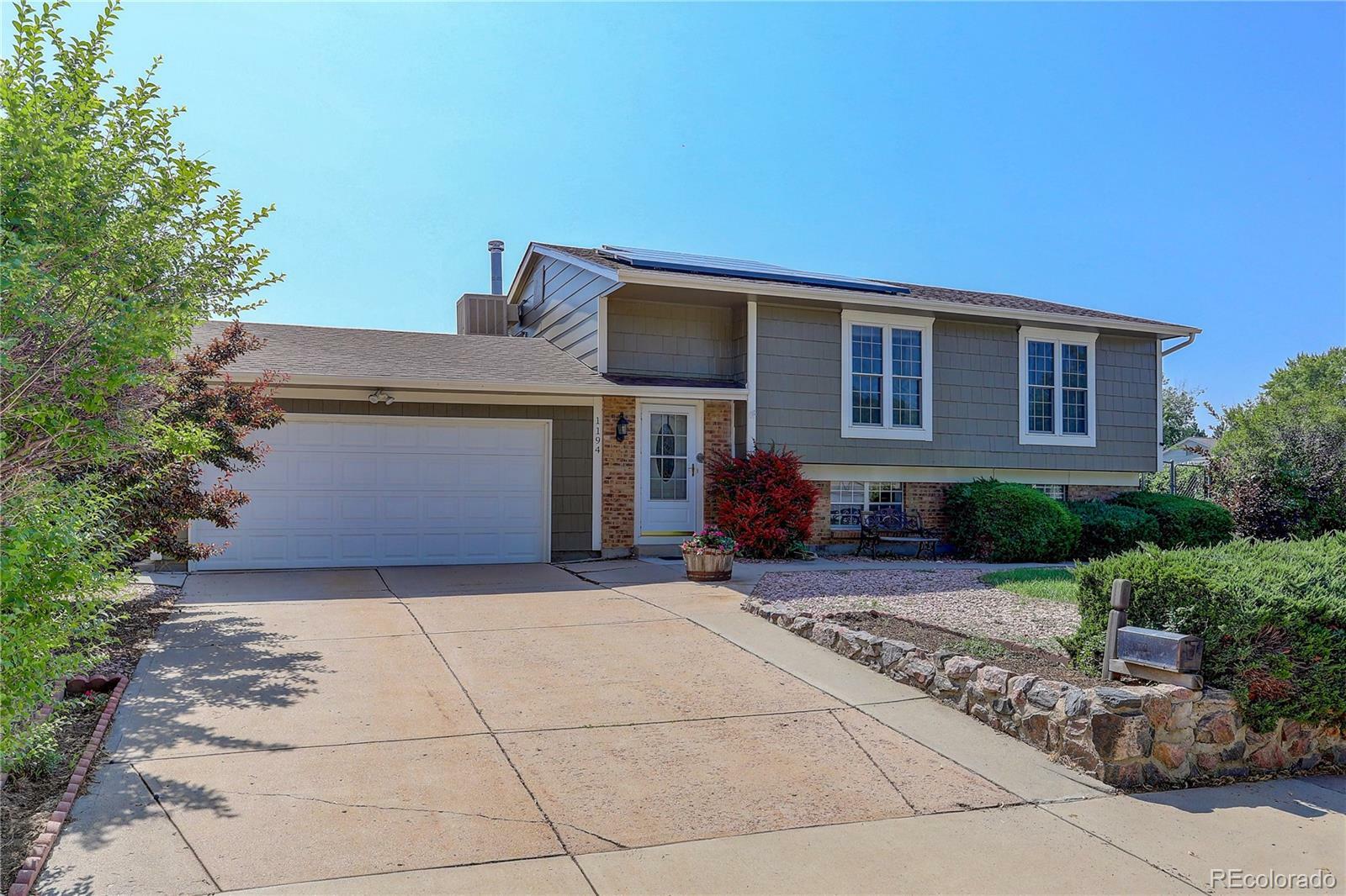 Property Photo:  1194 S Lewiston Way  CO 80017 