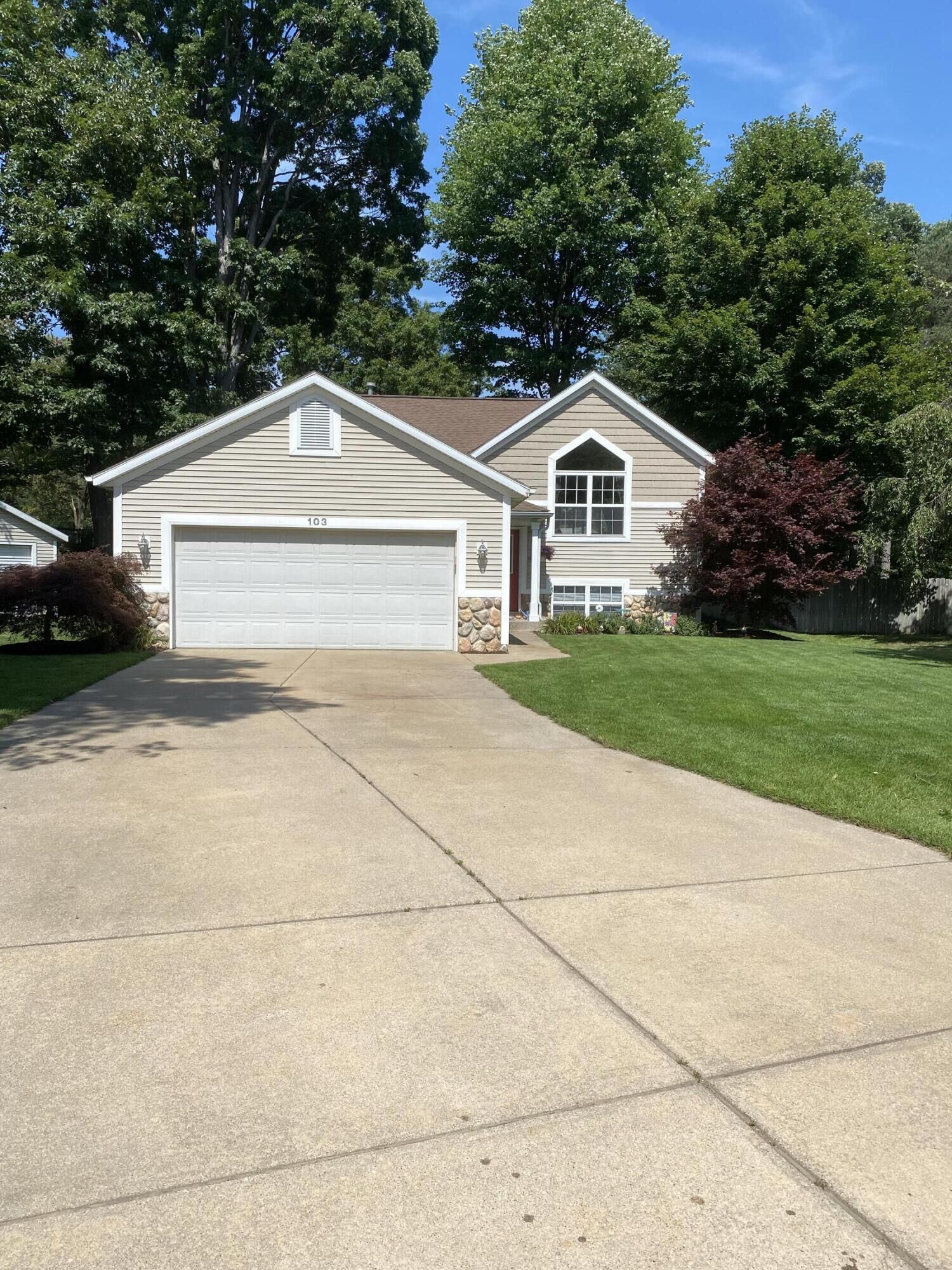 Property Photo:  103 Elwood Court  MI 49424 