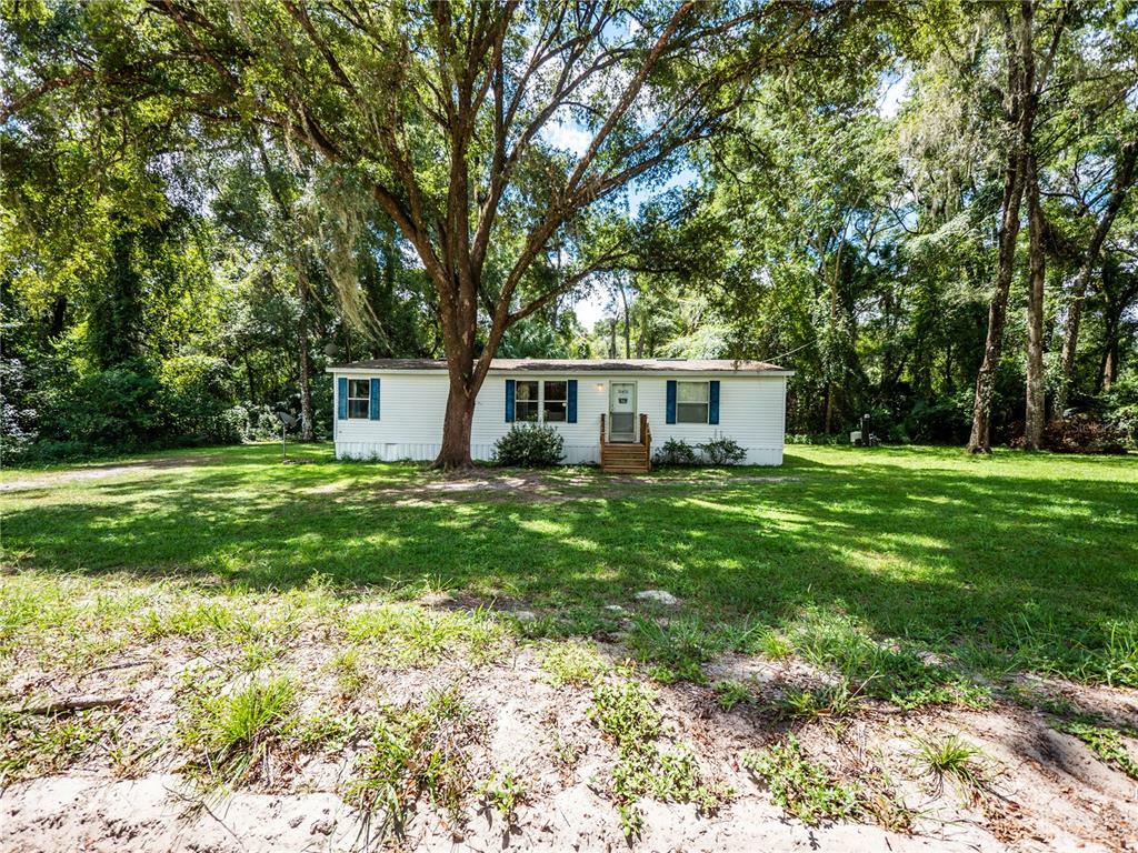 Property Photo:  3030 NE 162nd Place  FL 32113 