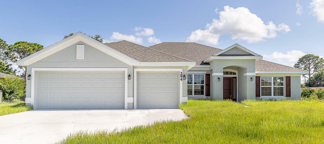 Property Photo:  6947 NW Hershy Circle  FL 34983 