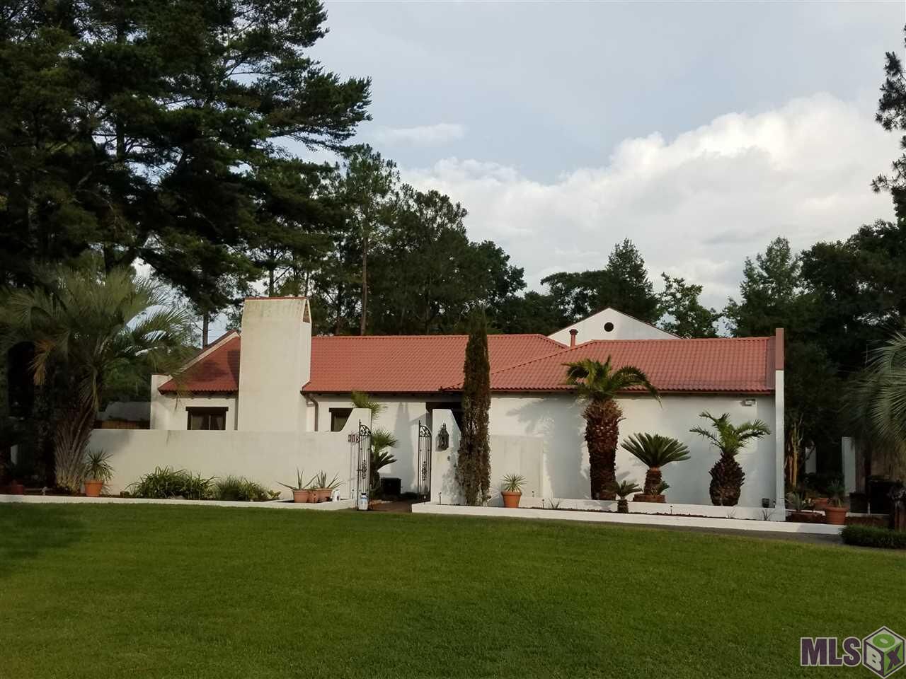 Property Photo:  413 Jean Lafitte Ave  LA 70810 