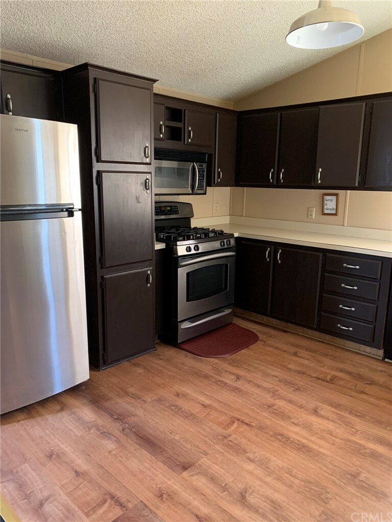 Property Photo: 140 W Pioneer Avenue 136 CA 92374