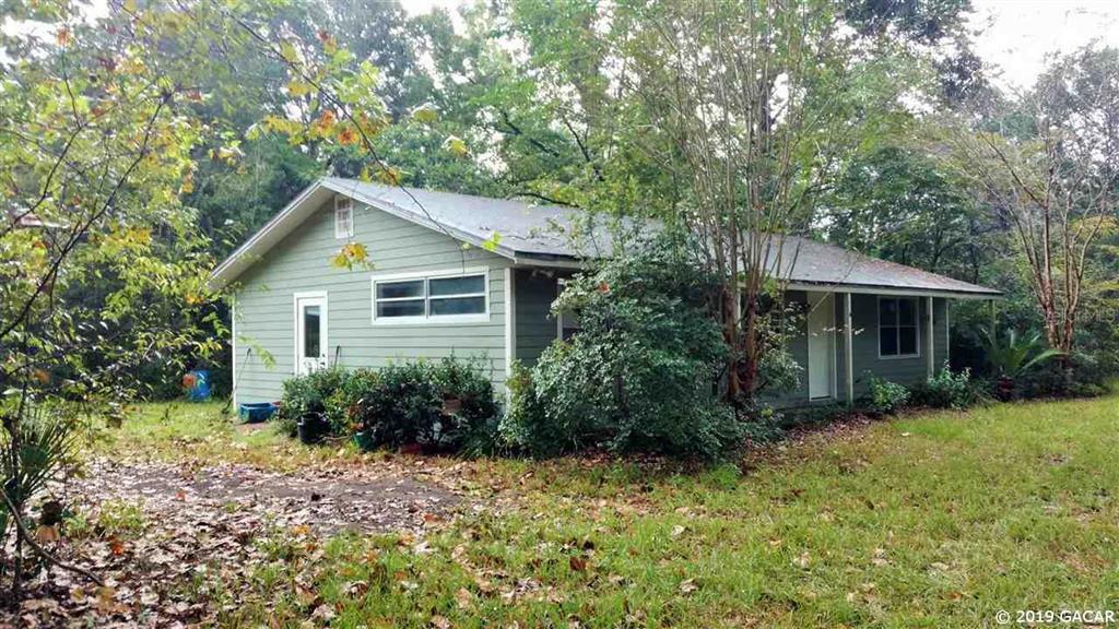 Property Photo:  10222 SW 122nd Street  FL 32608 