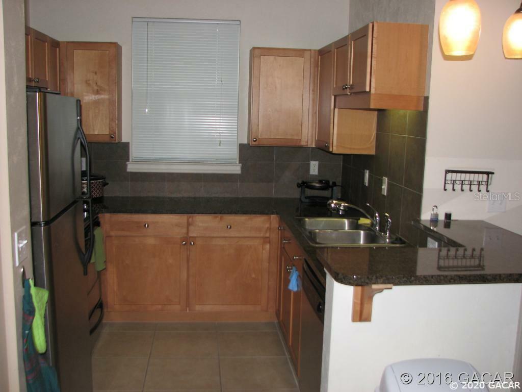 Property Photo:  3027 SW Archer Road  FL 32608 