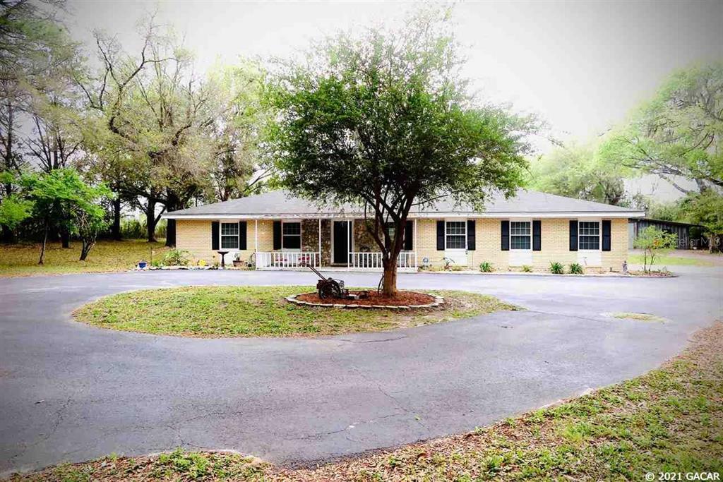 Property Photo:  19721 NW 62nd Avenue  FL 32615 