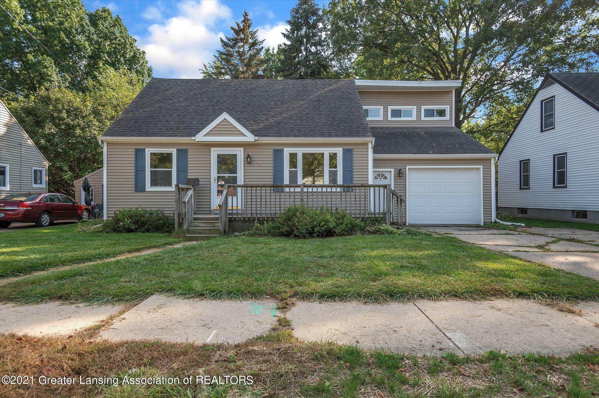 Property Photo:  1311 Victor Avenue  MI 48910 