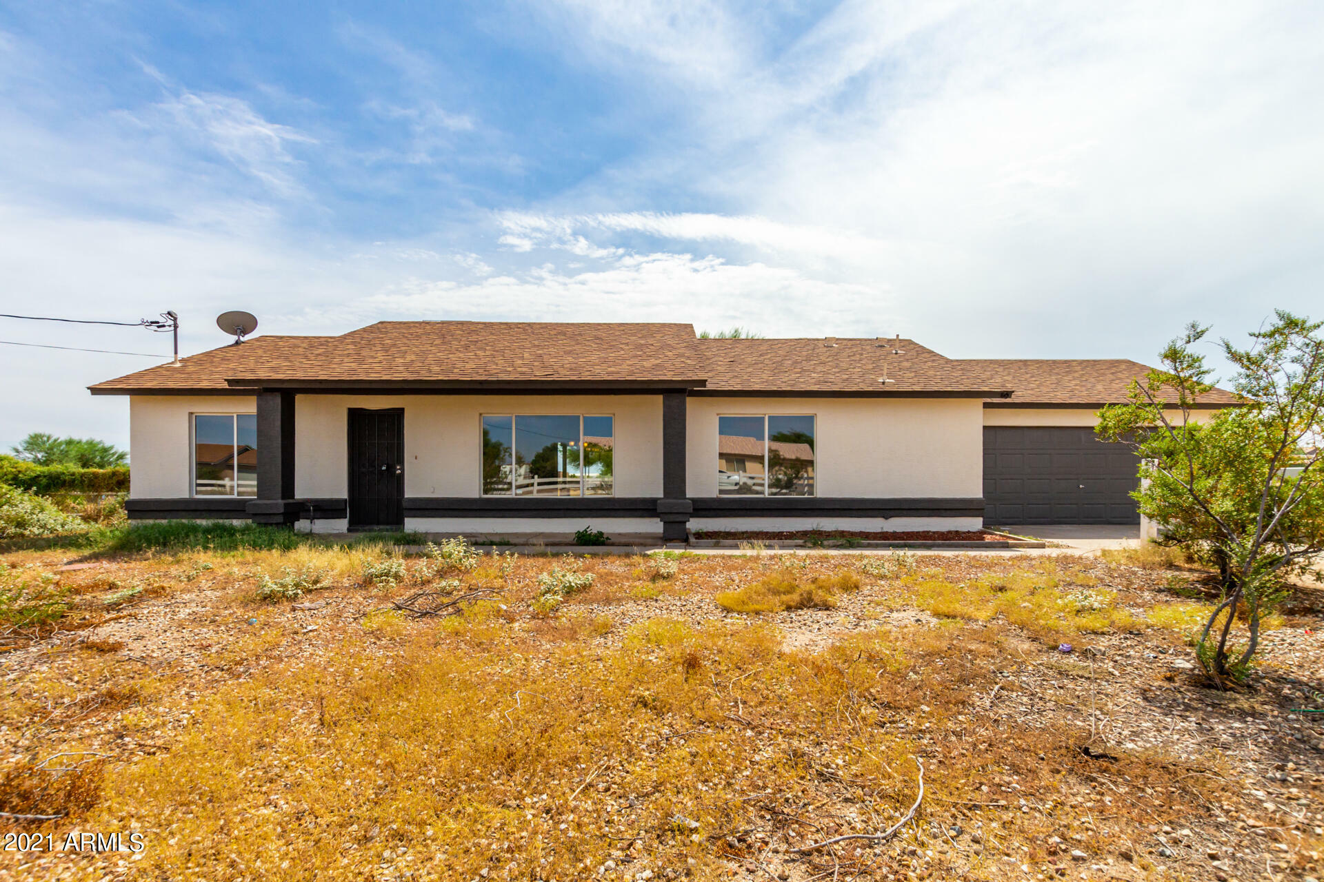 Property Photo: 19233 W Windsor Avenue AZ 85396
