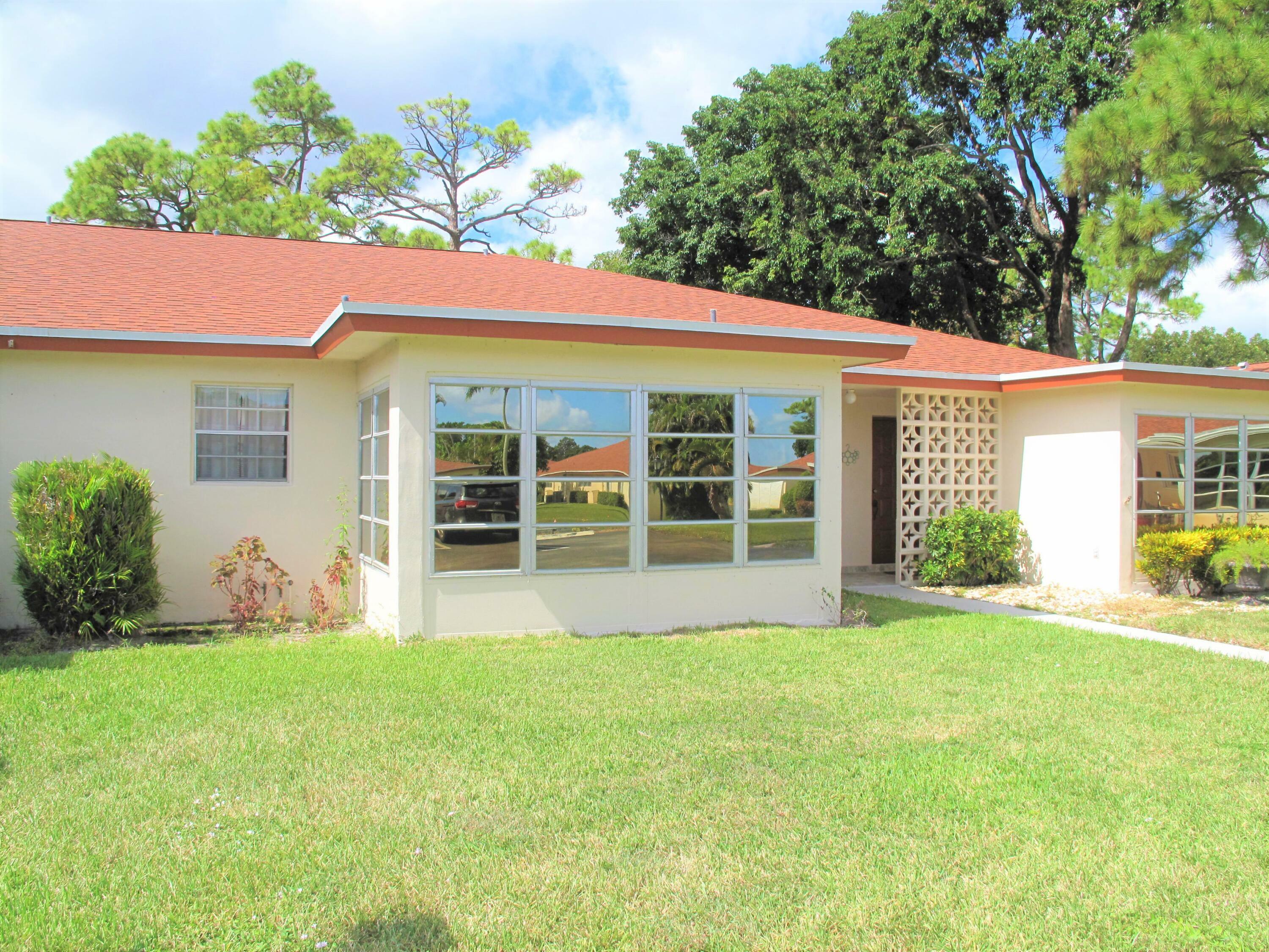 Property Photo:  4875 NW 2nd Street C  FL 33445 