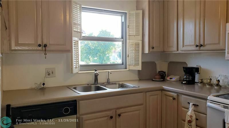 Property Photo:  700 SE 6th Ave 217  FL 33441 