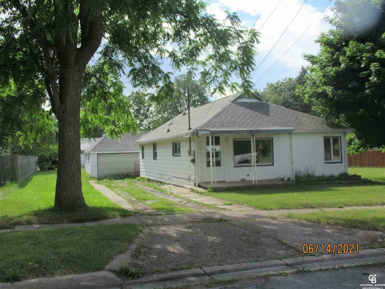 Property Photo:  700 Frazer Avenue  MI 48867 