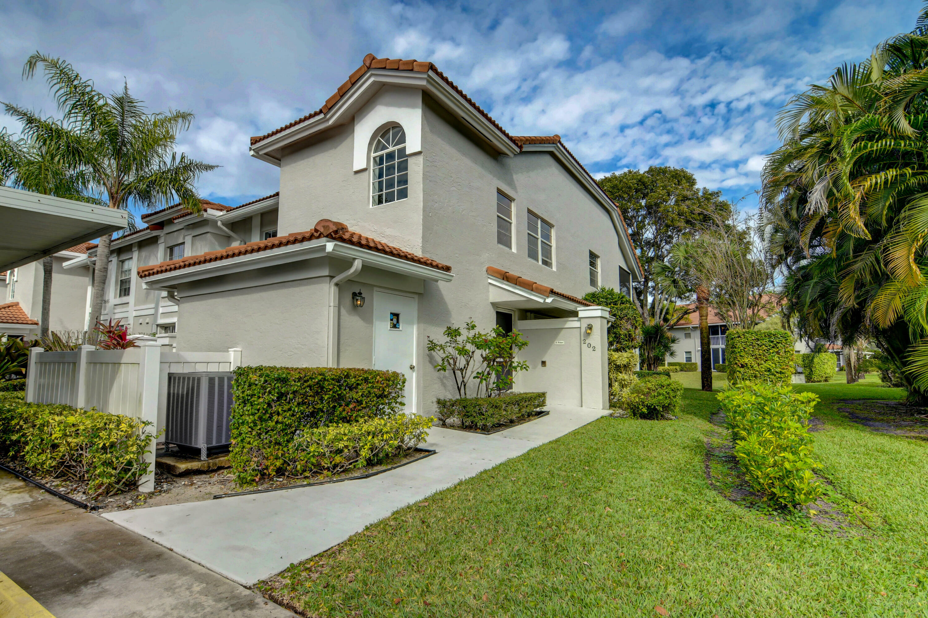 Property Photo:  7669 Springwater Place 202  FL 33437 