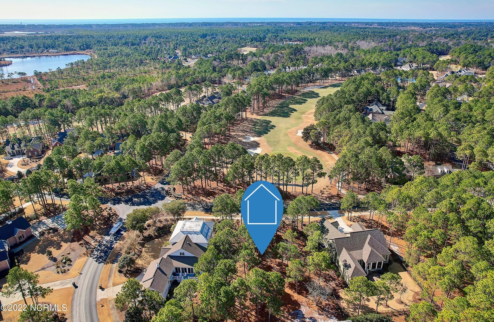 Property Photo:  3712 Players Club Drive SE  NC 28461 