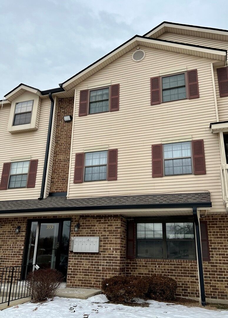 Property Photo:  353 S Whispering Hills Drive A  IL 60540 