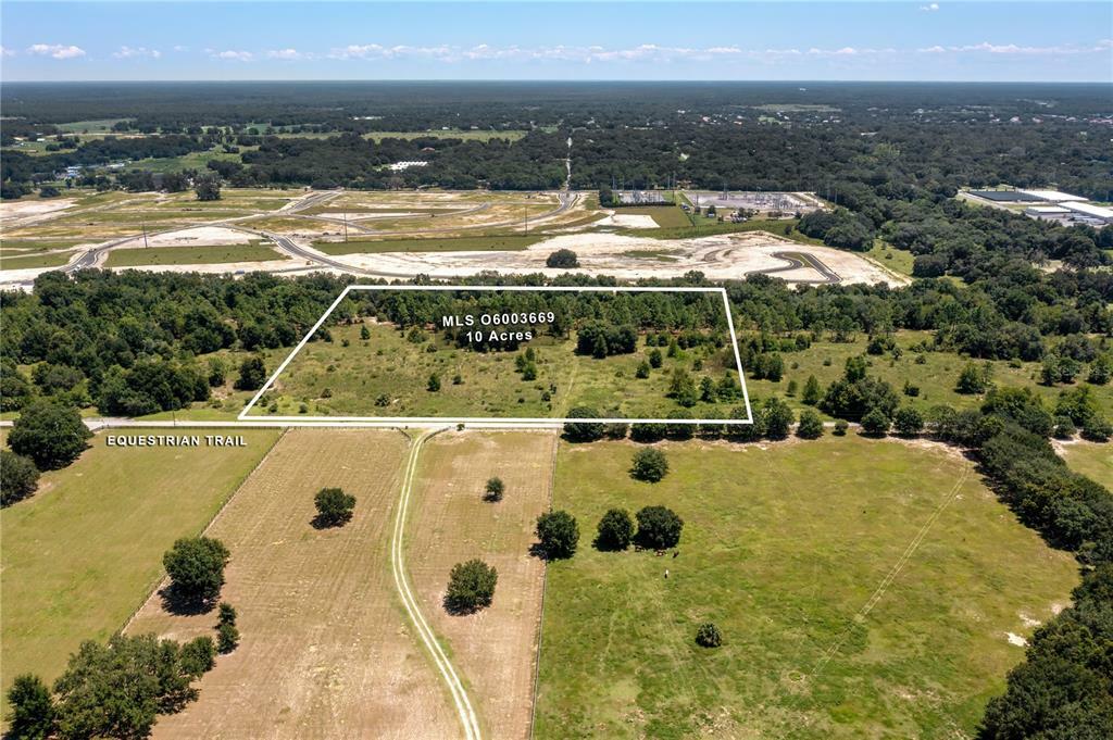 Property Photo:  Equestrian Trail  FL 32776 