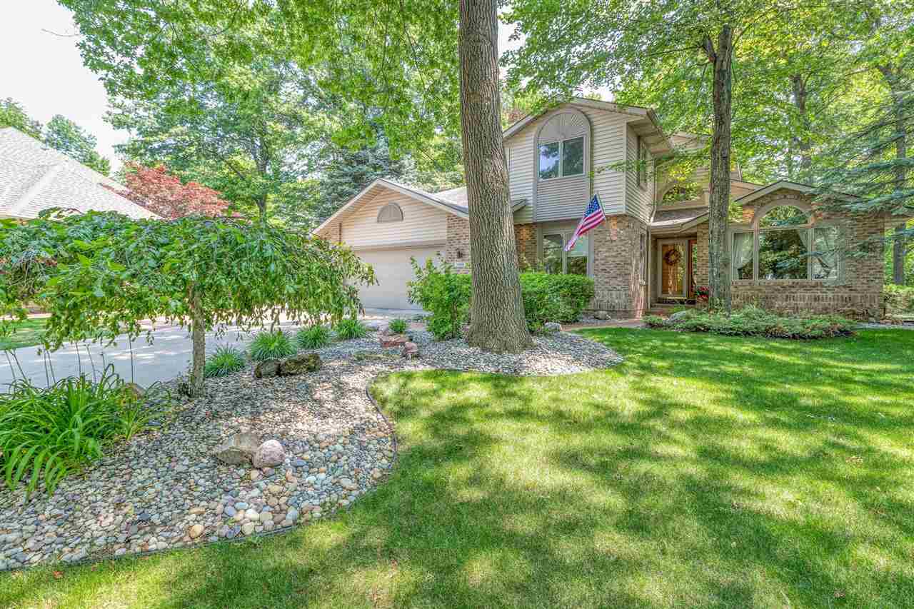 Property Photo:  5008 Whispering Oak Circle  MI 48642 