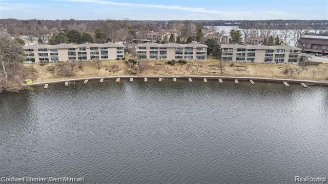 Property Photo: 855 Cliffs Drive 303-C MI 48198