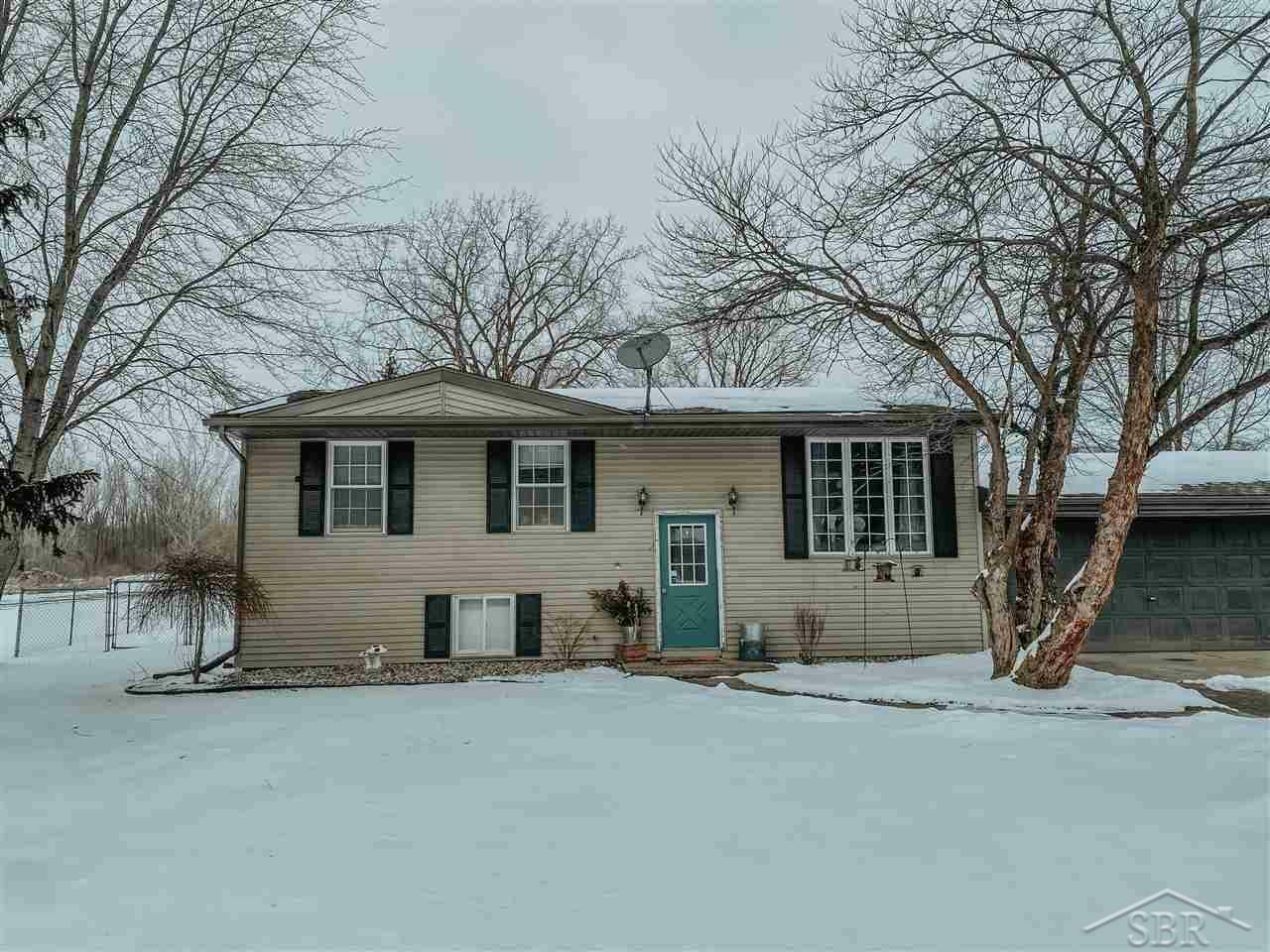 Property Photo:  12496 Frost Rd  MI 48626 