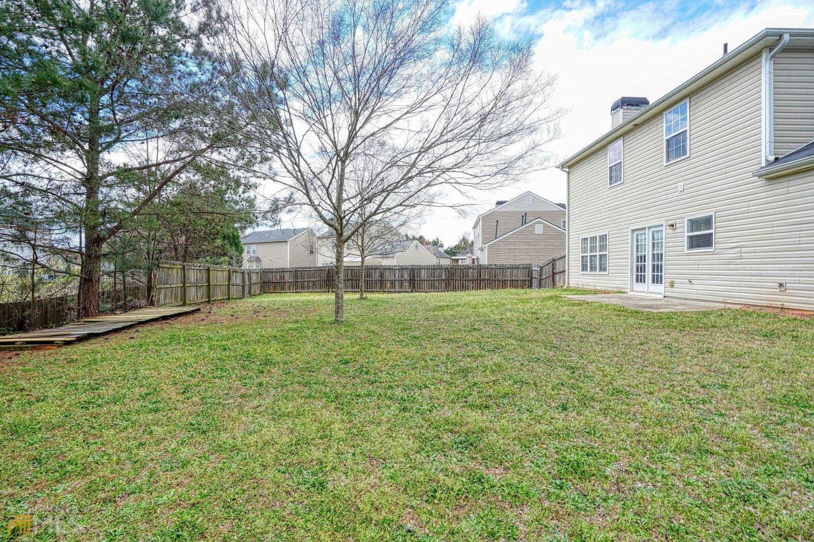 Property Photo:  3913 Willow Fields Court  GA 30052 