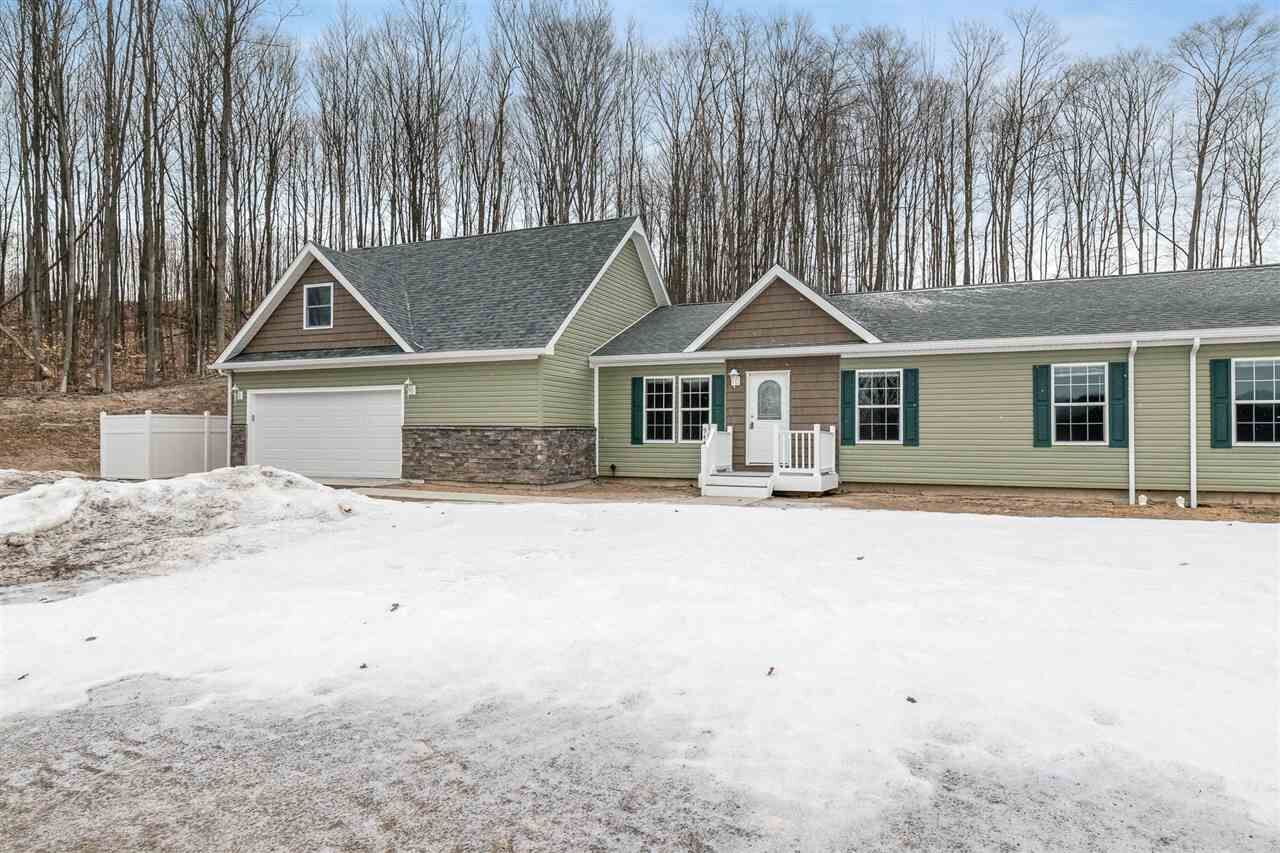 Property Photo: 940 Windsong Place # 33 MI 49770