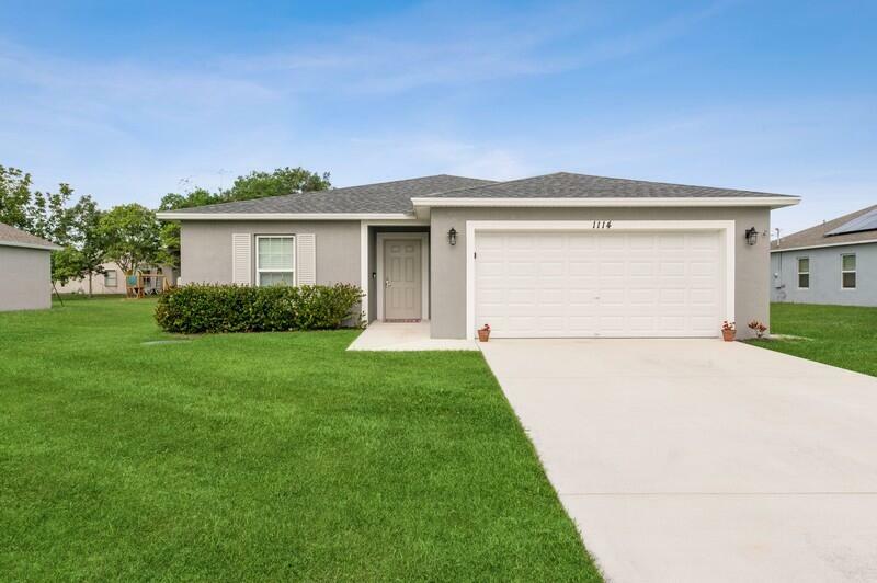 Property Photo:  1114 SW Ivanhoe Street  FL 34983 