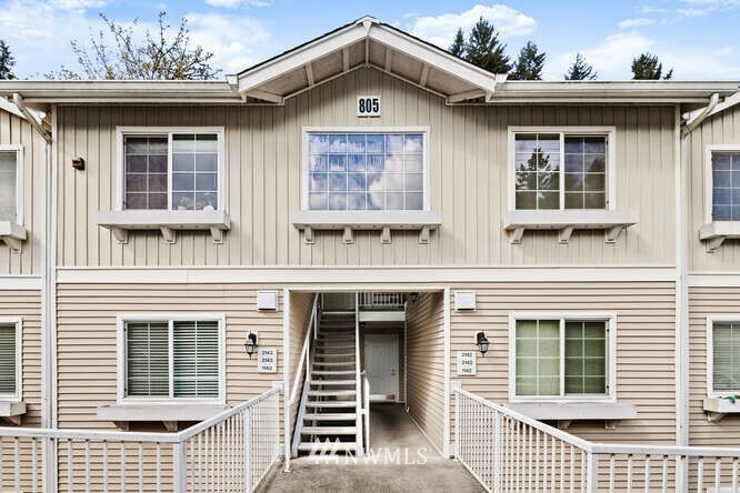 Property Photo:  805 Harrington Place SE 1143  WA 98058 