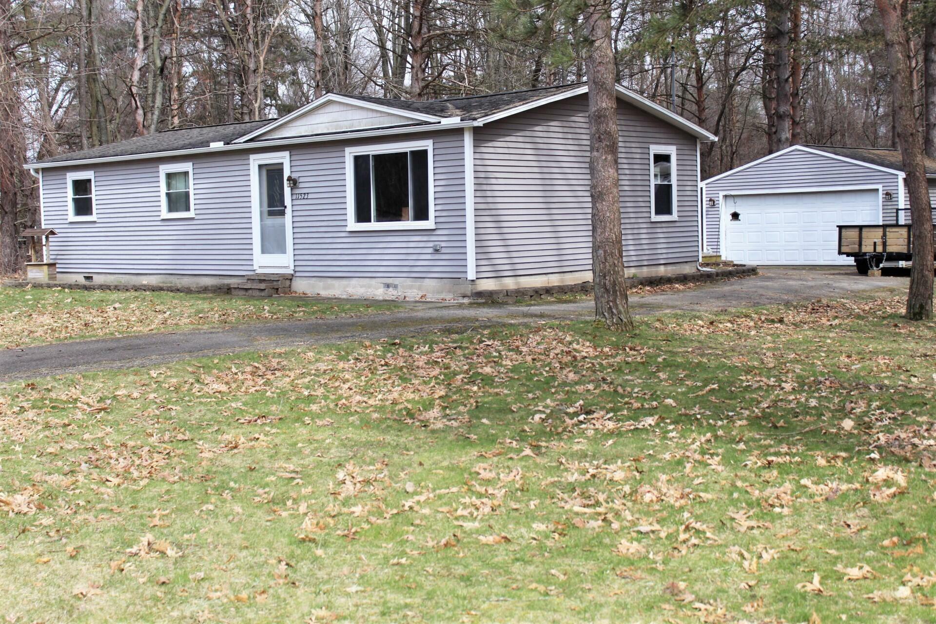 Property Photo:  11523 Hillary Drive  MI 49249 