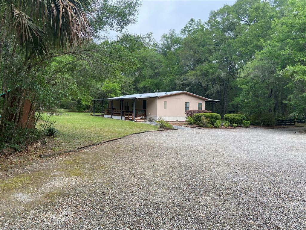 Property Photo:  16513 SW 67th Place  FL 32618 