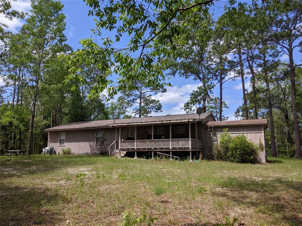 Property Photo:  3500 NE 64th Avenue  FL 32643 