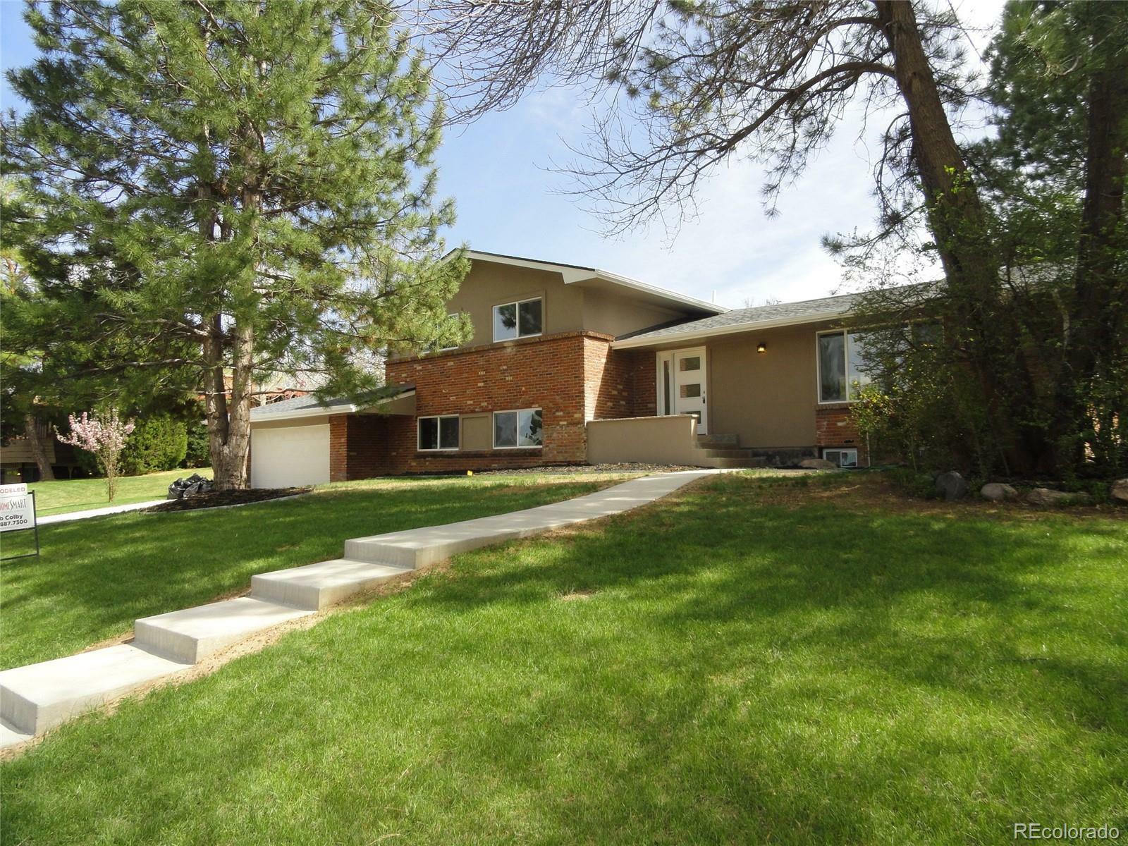 Property Photo: 5220 W Ottawa Avenue CO 80128