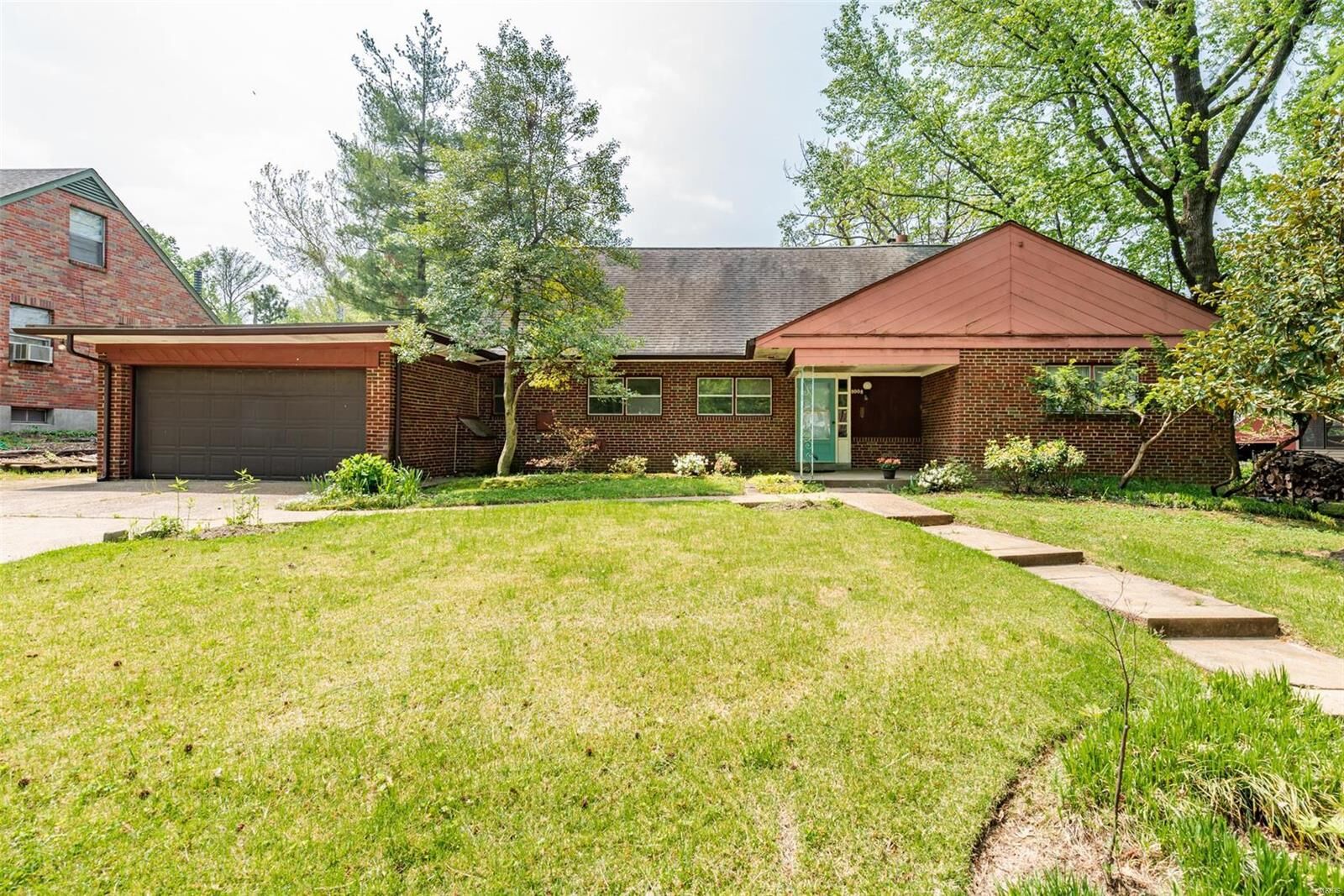 Property Photo:  8008 Audrain Drive  MO 63121 