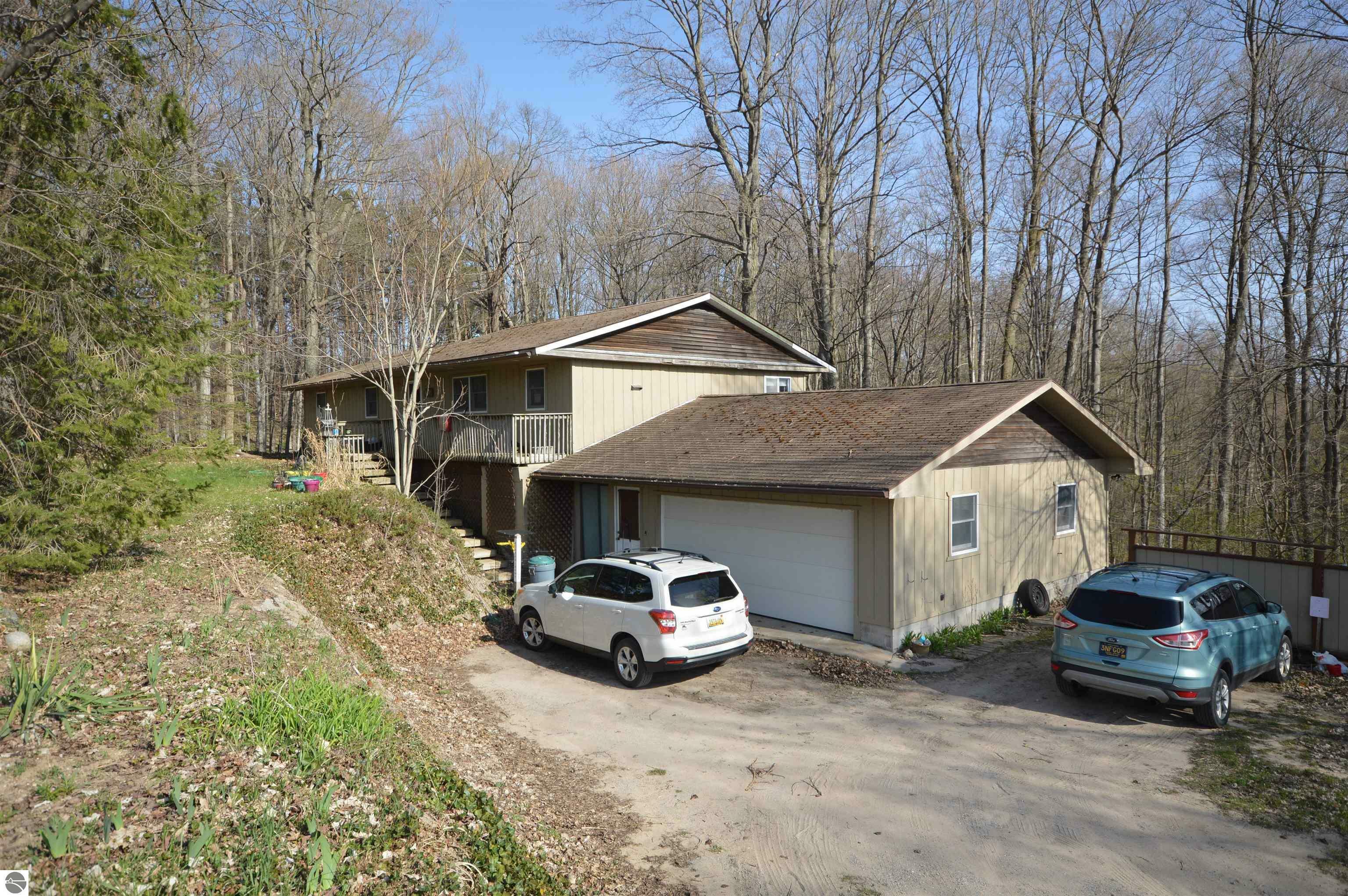 Property Photo:  6403 Cedar Run Road  MI 49684 