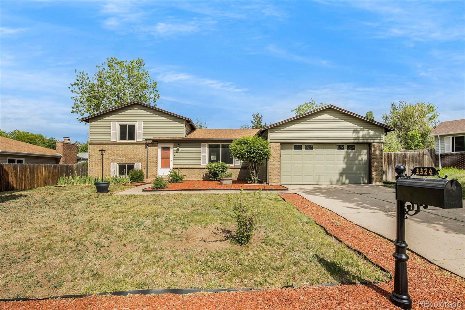 Property Photo: 3324 S Jasper Court CO 80013