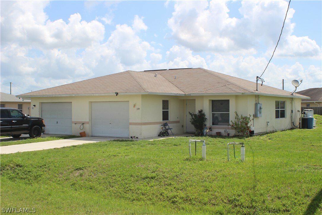 Property Photo:  375-377 Paisley Avenue  FL 33974 