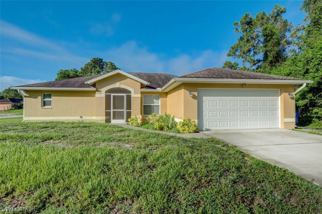 Property Photo:  964 Iris Street E  FL 33974 
