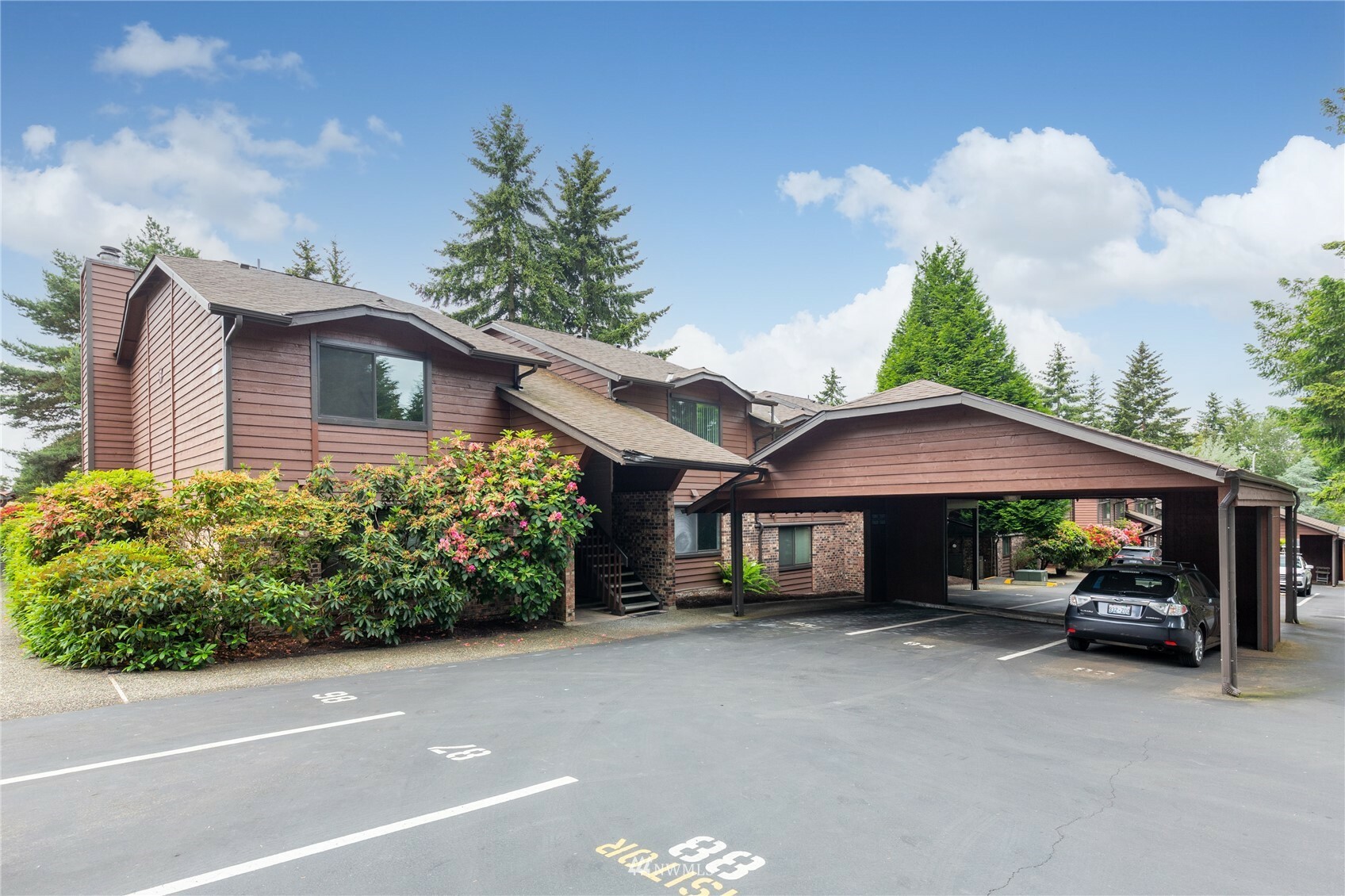 Property Photo:  15617 NE 18th Street F201  WA 98008 